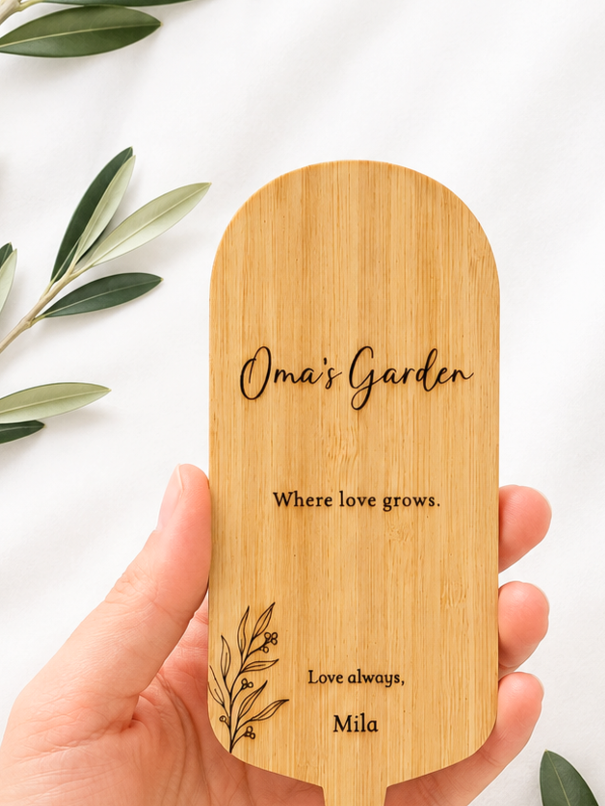 Custom engraved wooden plant stake with personalised message